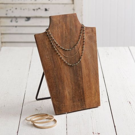 Display a statement piece for decoration or organize your jewelry with this wooden necklace bust. It is made of a carved wood and stands with a metal famed base. Measurement: 8¼''W x 5½''D x 11½''H Jewelry Shop Display, Necklace Stand, Necklace Organizer, Necklace Display, Wooden Necklace, Wood Necklace, Jewelry Stand, A Metal, Jewelry Holder