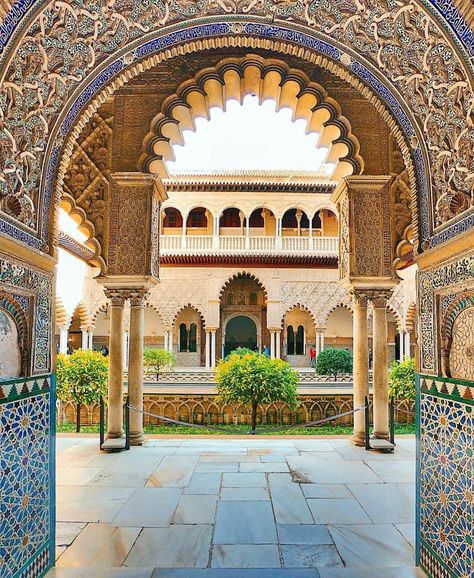 Alcázar of Seville, Seville, Spain 🇪🇸 The Alcázar of Seville, located in Seville, Spain, is a stunning example of Mudéjar architecture, blending Islamic and Christian influences. Originally built as a Moorish fort, it has evolved over the centuries into a royal palace, making it one of the oldest palaces still in use in Europe. The intricate tilework, lush gardens, and beautiful courtyards make it a must-visit site in Seville. Andalusian Architecture, Alcazar Seville, Moorish Architecture, Sevilla Spain, Seville Spain, Southern Europe, Voyage Europe, Salou, Spain And Portugal