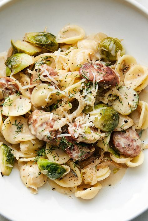 Orecchiette With Brussels Sprouts and Bratwurst Recipe - NYT Cooking Fall Pasta, Bratwurst Recipes, Arugula Recipes, Sausage Spinach, Pork And Cabbage, Cold Pasta Salad, Easy Pasta Dishes, Small Pasta, Nyt Cooking