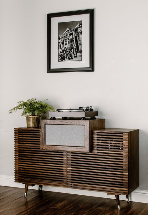 Features Minimalist all-in-one design created to hold a turntable and Sonos 5 or other powered speakers. Classic Mid-century slatted doors with soft close hinges to reduce turntable interference. Tumbler glass rack in lower cabinet. Record Storage Capacity 275 Materials Combination of solid hardwoods, furniture-grade veneers, and metal hardware Construction Hand-built using traditional joinery methods. Carefully engineered to carry the load of gear and records. Finish Alls surfaces professionall Hidden Speakers, Hifi Furniture, Cabinet Depth, Traditional Joinery, Speaker Grill, Acoustic Fabric, Stereo Cabinet, Living Room Wall Units, Tumbler Glass