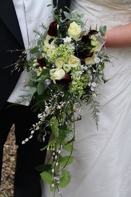 ***** Wedding Bouquet like the scale of this; yellow roses, lavender, purple stock and lisianthus, white wax flowers, queen annes lace, babys breath, seeded eucalyptus, trailing ruscus Beautiful!!!! (No lily grass) Cascade Wedding Bouquet, Trailing Bouquet, White Wax Flower, Cascading Bridal Bouquets, Cascading Wedding Bouquets, Rosé Christmas, Winter Wedding Bouquet, Winter Rose, Cascade Bouquet