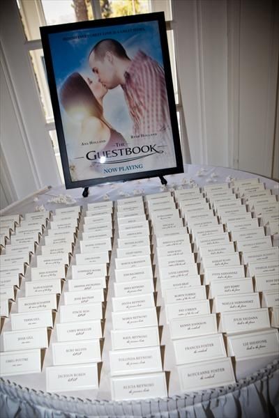 @Mandy Bryant Dewey Seasons Bridal Behind the place cards: any movie reference should have bride and groom portrait it The Notebook Wedding, Reception Layout Ideas, Cinema Themed Wedding, Notebook Wedding, Movie Wedding, Wedding Reception Layout, Diy Wedding Guest Book, Bday Celebration, Reception Layout