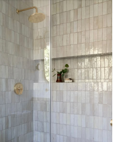 ✨Here we see inspiration images for the master en-suite i’m working on with my clients in Brighton. 🌿Anything here takes your fancy? I love how the tiles are laid (soldiers), the long shower niche and the use of a half wall built to host taps as a shelf. Images from the beautiful work of: @claudiadorshinteriordesign @formandfield @popixdesigns #homerenovations #homeremodel #homedesignideas #homeimprovementproject #renovationinspiration #renovationideas #beforeandafter #home im... Master Shower Built In Shelf, Long Niche In Bathroom, Long Bathroom Niche, Horizontal Shower Niche Ideas, Shower With Built In Shelf, Arched Shower Shelf, Long Niche Bathroom, Half Wall Tiling Bathroom, Long Horizontal Shower Niche