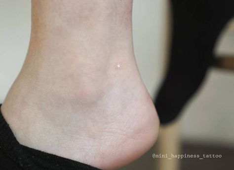 Micro white star tattoo on ankle White Star Tattoo, Small White Tattoos, Tattoo On Ankle, Heart Tattoo Ankle, Secret Tattoo, Full Hand Tattoo, Happiness Tattoo, Rib Tattoos For Women, Bookish Tattoos