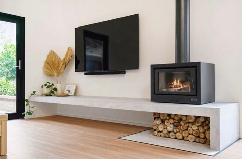 Concrete doesn’t have to be overpowering, in fact, quite often it’s raw simplicity is the finishing touch a room needs. This 4m long… | Instagram Wood Fire Living Room, Living Room Designs Wood Stove, Wood Fireplace Tv Wall, Wood Heater Ideas Living Rooms, Freestanding Fireplace Living Rooms, Cool Fireplaces, Wood Stoves Ideas Living Rooms, Burnished Concrete, Concrete Hearth