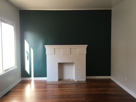 White Fireplace Green Wall, Dark Teal Fireplace, Green Wall White Fireplace, Dark Green Accent Wall Living Room, How To Start Painting, Teal Accent Walls, Dark Wooden Floor, Green Painted Walls, House Renos