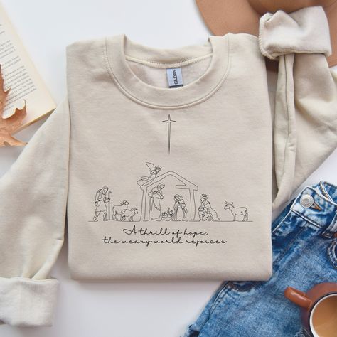 The Weary World Rejoices, Weary World Rejoices, A Thrill Of Hope, Thrill Of Hope, Christian Embroidery, Holiday Clothes, Kurta Designs Women, Religious Christmas, Xmas Shirts