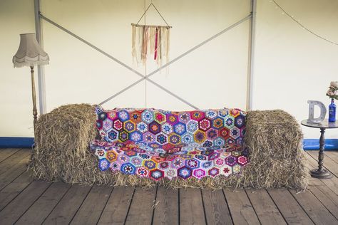 straw bales, sofa, colourful, crochet blanket, marquee, wedding reception, Cornish Tipi Weddings, appleBimages Catering Drinks, Port Isaac, Romantic Outdoor Wedding, Boho Country, Straw Bale, Straw Bales, Gospel Singer, Tipi Wedding, Sustainable Wedding