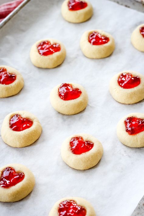 These Valentine's Day Thumbprint Cookies are so cute and delicious! With a brown sugar shortbread base and red jelly hearts, these are perfect for love day! You might want to double the batch! ❤️ Brie Cheese Appetizer, Sugar Shortbread Cookies, Brown Sugar Shortbread, Small Batch Cookies, Jelly Hearts, Valentine Sugar Cookies, Thumbprint Cookies Recipe, Buttery Shortbread Cookies, Jam Cookies