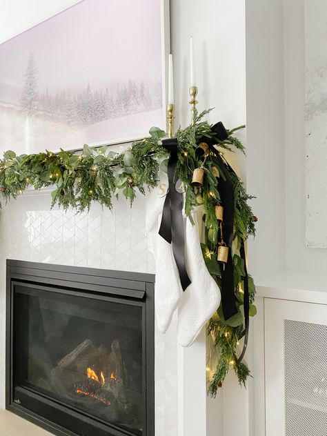 Bells On Mantle Christmas, Christmas Garland Tv Stand, Garland Entryway, Layered Garland, Christmas Staircases, Christmas Garland Fireplace, Christmas Fireplace Mantel, Moody Christmas, Christmas Fireplace Mantels