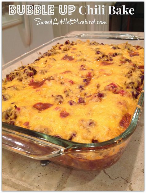 BUBBLE UP CHILI BAKE - Delicious casserole made with chili,  refrigerator biscuits and cheddar cheese! Simple to make, so good.  | SweetLittleBluebird.com Refrigerator Dough, Refrigerator Biscuits, Chili Bake, Beef Entrees, Hamburger Dishes, Bubble Up, Yummy Casseroles, Cheap Dinners, Baking Dish