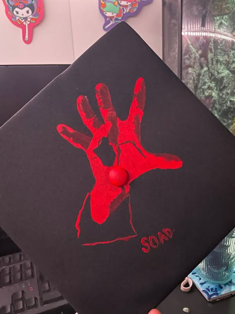 my granduation cap 🙀 #SOAD #SYSTEMOFADOWN #graduation Korn Graduation Cap, Deftones Graduation Cap, Radiohead Graduation Cap, Emo Grad Cap, Gothic Graduation Cap, Mcr Graduation Cap, Graduation Cap Designs Music, Goth Graduation Cap, Album Cover Graduation Cap