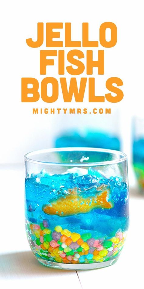 Jello Fish Bowls - A fun and edible craft or party treat using Nerds, Jello and colorful Swedish fish. Make these little fish tanks to celebrate Dr. Seuss week, shark week (use gummy sharks), an underwater themed birthday party or a summer pool party. Or heck, just because they're so adorable and yummy too! Toddlers get a kick out of this snack. Makes a great indoor, rainy day activity for summer months too. Fish Tank Dessert Cups, Edible Food Art, Swedish Fish Cake, Indoor Pool Birthday Party, Fish Bowl Jello, Jello Aquarium, Mountain Birthday, Gummy Sharks, Pool Party Snacks