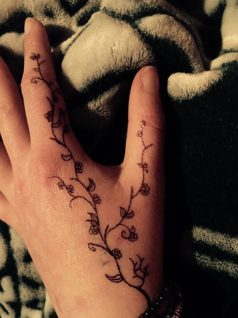 Hand Tattoo Flash, Vine Flowers Flower Vines Hand Tattoo, Feminine Thumb Tattoos, Vine On Hand Tattoo, Vines On Hand Tattoo, Small Flowers On Vines Tattoo, Hand Tattoos Vines, Ivy Tattoo On Hand, Vine Tattoo On Hand And Wrist, Rose Vine Hand Tattoo