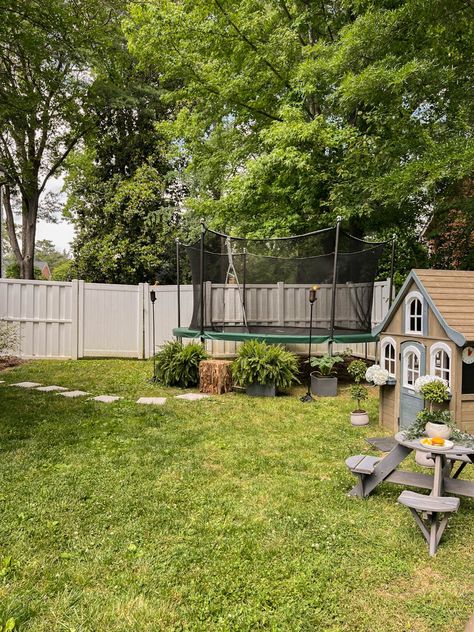 Kids' outdoor play area and trampoline decor ideas to make a side yard or backyard more aesthetic and functional. Backyard Playground Aesthetic, Backyard Kids Play Area Trampoline, Trampoline Ideas Backyard, Kid Play Area Backyard, Side Yard Play Area, Trampoline Decor, Trampoline Landscape Ideas, Under Trampoline Ideas, Trampoline Landscaping