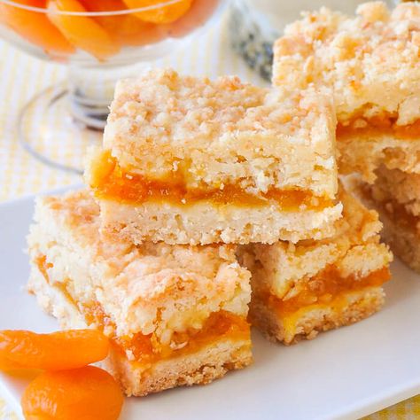 These Apricot Coconut Crumble Bars are a twist on a lemon version of the same cookie bars recipe but could easily be made with any jam filling you prefer. Custard Squares, Orange Custard, Apricot Recipes, Rock Recipes, Crumble Bars, Cookie Bar, Slices Recipes, Bar Recipe, Cookie Bar Recipes