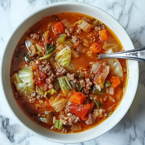 Cabbage Roll Soup - Yeyfood.com: Recipes, cooking tips, and kitchen hacks for home cooks of all levels Deep Dish Pizza Bites, Healthy Cabbage Soup, Easy Stuffed Cabbage, Hacks For Home, Cabbage Stew, Cabbage Roll Soup, Lipton Onion Soup Mix, Cabbage Roll, Soup With Ground Beef