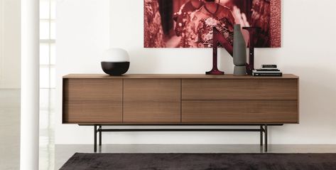 The only piece of furniture that has never gone out of fashion since its inception is a chest of drawers. It's a versatile piece that can be used in any room. Let's take a look at the stylish Italian chests and servers now on offer from Italian brand Porada.Nothing looks as attractive... Smoked Mirror, Walnut Sideboard, Outdoor Bar Table, Wooden Sideboard, Sofa Storage, Modern Sideboard, Outdoor Bar Stools, Bathroom Wall Sconces, Dining Room Bench