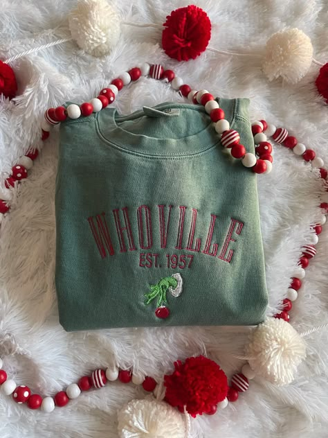 Get in the festive spirit with our Christmas Whoville Sweatshirt! Perfect for the holiday season. This sweatshirt is not only comfortable and cozy - it is made of a high quality preshrunk fleece to keep you warm throughout the winter months.  This sweatshirt is available in 6 colors:  🎄 White 🎄 Pepper Gray 🎄 Light Gray 🎄 Blue Spruce 🎄 Light Green (as seen in listing photo) 🎄 Crimson Red (words will be white) If there is a color you have in mind other than the ones listed, send me a message Christmas Whoville, Gift For Friends Christmas, Friends Christmas, Embroidered Gifts, Embroidered Crewneck, Stocking Stuffer Gifts, Christmas Gifts For Friends, Christmas Lettering, Winter Fits