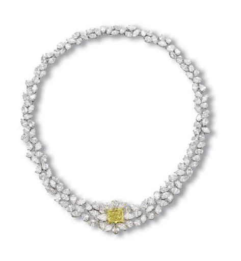 A COLOURED DIAMOND AND DIAMOND NECKLACE, BY GRAFF    Centering upon a modified rectangular-cut fancy intense yellow diamond weighing approximately 7.80 carats, within a pear-shaped and marquise-cut diamond surround to the graduated vari-cut diamond neckchain, mounted in platinum and yellow gold, 41.8 cm long    Signed Graff, no. 4286 Graff Diamond Necklace, Graff Necklace, Graff Jewelry, Yellow Diamond Necklace, Graff Diamonds, The Bling Ring, Yellow Jewelry, Jewel Necklace, Fancy Diamonds