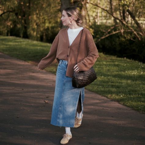 When I swapped my denim jeans for a denim skirt but in all honestly, I was cold 😆 even with the cardigan and enclosed shoes. But hey, that’s summer24 🤷🏼‍♀️ #ootd #outfitpost #outfitstyle #ootdstyle #outfitdaily #denimskirt #denim #sneakers #casualstyle #mumstyle #adidassamba #lookoftheday #dailylook #styleoftheday Winter Skirt Outfit With Sneakers, Denim Skirt For Fall, Spring Baggy Dark Wash Denim Skirt, Denim Skirt Cardigan Outfit, Denim Skirt And Sweater Outfit, Denim Skirt Outfits Winter, Winter Denim Skirt Outfit, Fall Washed Denim Skirt, Jeans Skirt Outfit Winter