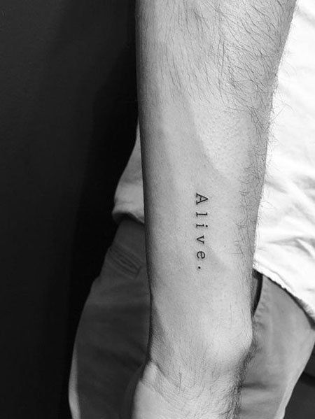 30 Cool Small Tattoo Ideas for Men in 2020 - The Trend Spotter Alive Tattoo, Sky Outfit, Meaningful Tattoos For Men, Wörter Tattoos, Happiness Tattoo, One Word Tattoos, Love Tattoo, Cat Tattoos, Small Tattoos Simple