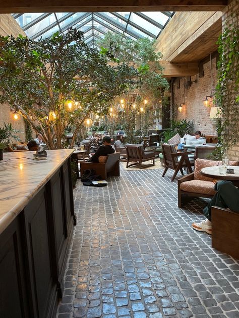 Restaurant Courtyard Design, Courtyard Restaurant Design, Greenhouse Cafe Design, Restaurant Conservatory, Greenhouse Coffee Shop, Indoor Garden Cafe, Conservatory Cafe, Green House Restaurant, Atrium Greenhouse