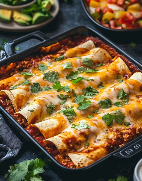 These Ground Beef Enchiladas are the ultimate comfort food. With tender tortillas wrapped around flavorful ground beef, all topped with a rich, tangy enchilada sauce and melted cheese, this dish ... Read more Ground Beef Tortilla Recipes, Ground Pork Enchiladas, Beef Enchiladas With White Sauce, Beef Enchiladas With Green Sauce, Beef Enchiladas With Red Sauce, Ground Beef Enchilada Casserole, Best Beef Enchilada Recipe, Enchiladas Beef, White Sauce Enchiladas