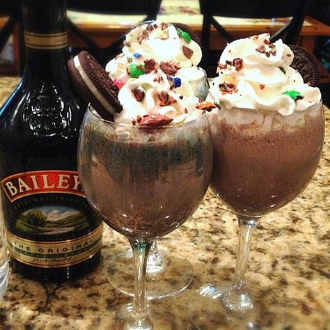 TRUFFLE SHUFFLE 3 oz. (90ml) Baileys Irish Cream 1 oz. (30ml) Vodka  3 Scoops Chocolate Ice Cream 2 Oreo Cookies Blend until smooth Garnish ... Ice Cream Drinks With Liquor, Baileys Milkshake, Irish Cream Truffles, Truffle Shuffle, Ice Cream Drinks, Wind Blowing, Tipsy Bartender, Baileys Irish, Boozy Drinks