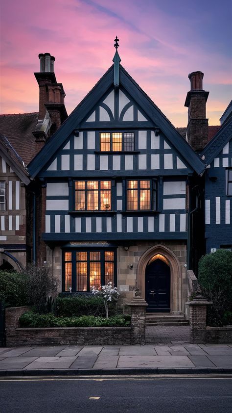 An image showcasing a Tudor-style house, inspiring you to infuse your space with Bridgerton-esque aesthetics. Colorful Tudor Exterior, Tudor Style Homes Floor Plans, Tudor Style House Exterior, French Home Exterior European Style, English Tudor Exterior, Tudor Revival House Exterior, English Tudor House, French Home Exterior, English Mansions