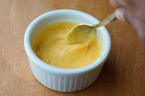 How to Melt Velveeta Cheese (with Pictures) | eHow Cheese Sauce Nachos, Velveeta Cheese Sauce, Recipes With Velveeta Cheese, Sausage Cheese Dip, Spicy Mac And Cheese, Cast Iron Oven, Block Of Cheese, Natural Cheese, Velveeta Cheese