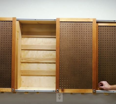 Make a DIY sliding door tool cabinet with pegboard Diy Tool Cabinet Storage, Sliding Pegboard Tool Storage, Pegboard Cabinet Door, Pegboard Storage Ideas, Diy Sliding Cabinet Doors, Diy Sliding Door Cabinet, Pegboard Door, Sliding Pegboard, Doors For Cabinets