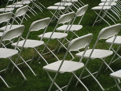 How to make wedding chair covers. When I was looking at rental prices renting ugly chairs along with chair covers cost more than renting slightly better chairs that I still didn't like so here is an article on how to make chair covers. Diy Wedding Chair Covers, Diy Folding Chair Covers, Wedding Chair Decorations Diy, Plastic Chair Covers, Wedding Chairs Diy, Wedding Chair Covers, Diy Chair Covers, Wedding Reception Chairs, Fold Up Chairs