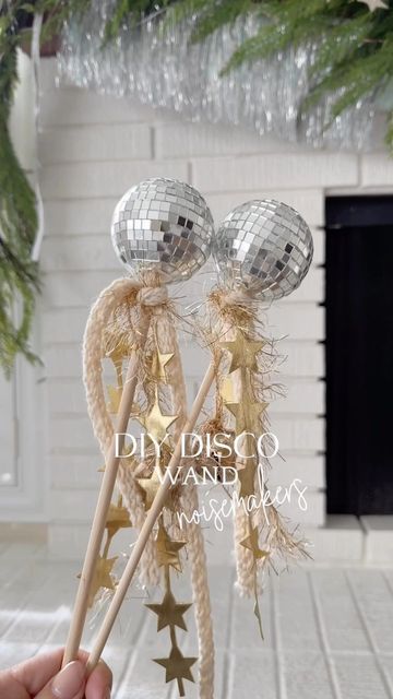 Deb seasonal inspo + diy on Instagram: "diy disco ball noisemakers 🪩 add some bells for a fun nye craft! you’ll need: mini disco balls (ornament size) dowels sparkly ribbon and bells *you can add a bit of hot glue to the dowels save and share with a friend💫 #diy #easydiy #diymama #newyear #happynewyear #newyearcraft #happy2023 #discoball #discoballs #celebrate #craftsforkids #mirrorball #bhgstylemaker" Disco Ball Crafts For Kids, Disco Ball Wreath, Disco Ball Christmas Decor, Disco Ball Craft, Disco Ball Garland, Disco Diy, Disco Ball Christmas Tree, Disco Ball Keychain, Disco Mermaid