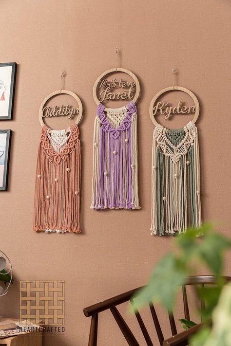 This gorgeous Custom Name Sign For Nursery Decor Hanger would be a perfect boho touch yet unique to complete your home decoration, Circle Wall Hanging, Boho Nursery Décor, or Macrame Wall Art. This could also be a perfect quirky idea for Birthday Gift, and Christmas Gift.
These lovely Personalized Name Sign Macrame Wall Hanging would brighten up your room with a boho vibe.
The name sign/dreamcatcher could be personalizable, then it is a perfect gift for your lover, Macrame Business Names, Macrame Name Wall Hanging, Circle Wall Hanging, Dream Catcher Macrame, Giveaways Ideas, Name Sign For Nursery, Name Hangers, Custom Name Sign, Macrame Wedding