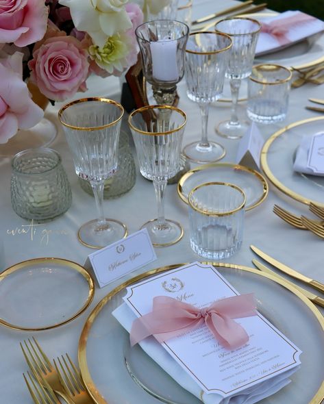 Golden elegance at every glance ✨ From the gilded rims on the crystal glasses to the shimmering gold flatware and chargers, every detail radiates sophistication and luxury. #eventigaia #GoldenDetails #LuxuryTablescape #OpulentElegance #GoldOnGold #weddingplanner #destinationwedding #tablesetup #misenenplace Clear And Gold Charger Plates Wedding, Clear And Gold Charger Plates, Gold Charger Plate Siign, Glass Gold Beaded Charger Plate, Gold Baroque Charger Plate, Gold Charger Plate, Gold Chargers, Gold Flatware, Table Set Up