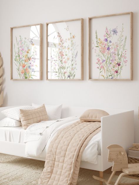 These lovely pastel wildflower prints would be a beautiful boho accent to your girl's nursery. Its soothing minimalist style will add a warm and cozy atmosphere to your girl's room. Vintage Flower Nursery, Toddler Bedroom Decor, Flower Nursery, Floral Nursery, Toddler Bedrooms, Flower Artwork, Butterfly Wall Art, Boho Nursery, Baby Prints