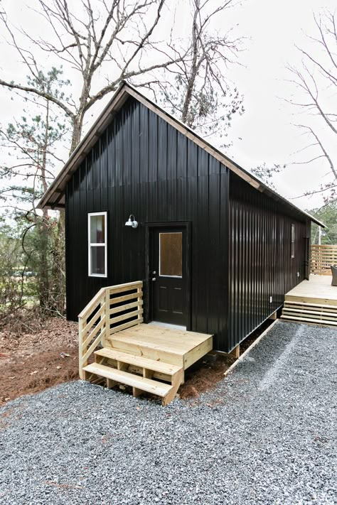 The 500-square-foot homes' walls are primarily made from local pine lumber, and the roofs are made tin. They share a connected wooden porch. Tiny Home Cost, Rural Studio, Black Cabin, Real Estat, Tiny House Movement, Tiny House Cabin, Cabins And Cottages, Tiny House Living, Tiny House Plans