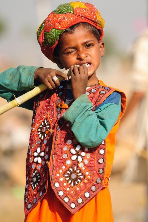 Child eating sugarcane. PUSHKAR, INDIA - NOVEMBER 7: A Rajasthani boy dressed in #Sponsored , #Affiliate, #Rajasthani, #NOVEMBER, #dressed, #boy, #INDIA Indian Boy, Mughal Empire, Kids Around The World, Mata Hari, India People, Asian Kids, Jaisalmer, We Are The World, Kids Styles