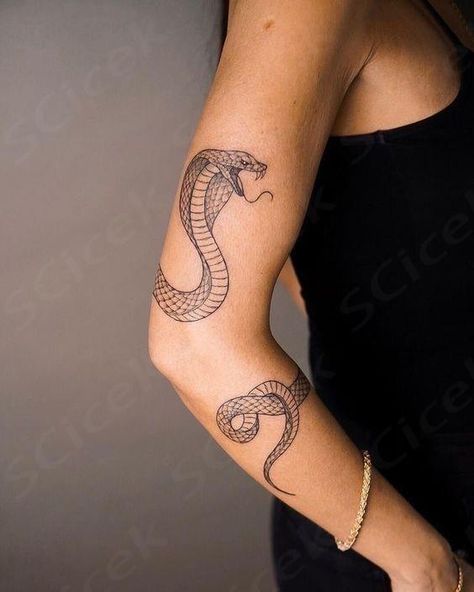 Contemplating whether a spiritual snake tattoo suits you? Here is the powerful spiritual meaning of snakes. Upper Arm Snake Tattoo, Snake Bicep Tattoo, Spiritual Snake Tattoo, Wrap Around Snake Tattoo, Snake Shoulder Tattoo, Snake Sleeve Tattoo, Spiritual Snake, A Snake Tattoo, Around Arm Tattoo