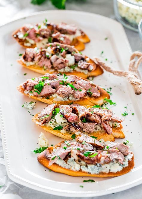 These Blue Cheese and Steak Crostini are a perfect addition to your holiday party or game day menu. Delicious grilled steak pieces over blue cheese, utterly scrumptious! www.jocooks.com #crostini Steak Crostini, Beef Main Course, Steak With Blue Cheese, Valentines Party Food, Leftover Steak, Jo Cooks, No Cook Appetizers, Crostini Recipes, Cocktail Party Food