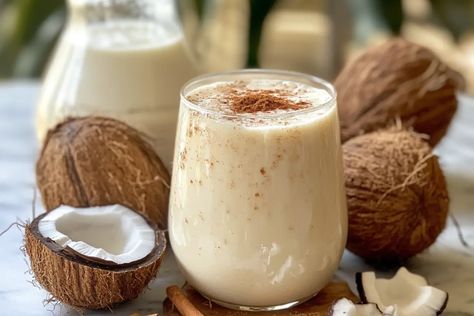 Learn how to make Coquito, a traditional Puerto Rican eggnog with coconut and rum. Perfect for holiday celebrations and festive gatherings! How To Make Coquito, Cucumber Appetizers, Coquito Recipe, Strong Drinks, Sweet Drinks, White Rum, Holiday Drinks, Holiday Celebration, Non Alcoholic