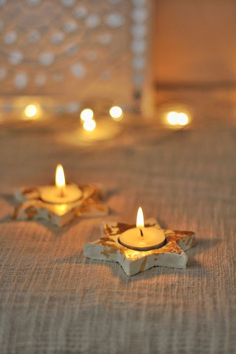 Star shaped tealight holder made using clay #claycraft #airdryclaycraft #diwalidecor #diwalidecorationsathome #diwalidiya #diwali #tealightcandleholders #candleholder Salt Dough Tea Light Holder, Air Dry Clay Tealight Holder Diy, Christmas Candle Holders Clay, Christmas Tealight Holders Diy, Easy Clay Candle Holder, Christmas Clay Candle Holders, Clay Tea Candle Holders, Diy Tea Light Holders, Air Dry Clay Taper Candle Holder Diy