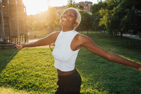 Happy woman with arms outstretched spinning at meadow stock photo Happy Woman, Reverse Image Search, Happy Women, Model Release, Painting Inspiration, Picture Perfect, Painting Ideas, Royalty Free Images, Brand Identity