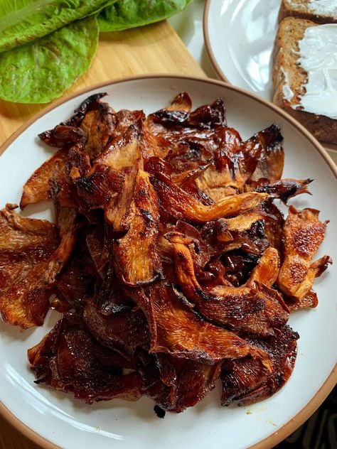 This Pink Oyster Mushroom Bacon is pretty darn close to the real thing! It's addicting, crispy, chewy and perfect for your next vegan BLT! Black Pearl Oyster Mushroom Recipes, Oyster Mushroom Bacon, Pink Oyster Mushroom Recipe, King Oyster Mushroom Bacon, Vegan Mushroom Bacon, Oyster Mushroom Recipes, Vegetarian Oyster Mushroom Recipes, Lions Mane Mushroom Recipe, Pink Oyster Mushroom