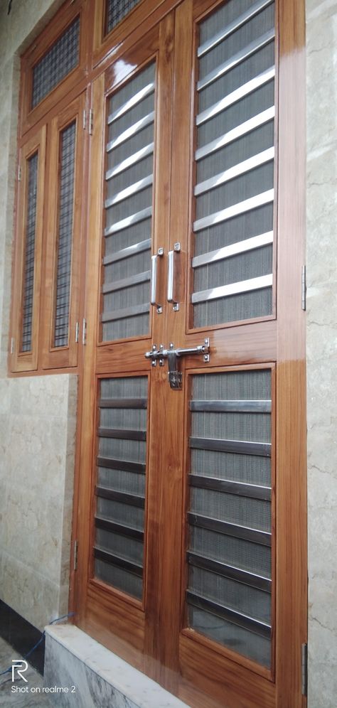 Iron Net Doors For Main Door, Double Door Net Design Wood, Double Door Net Design, Jaali Door Design Wooden Double, Double Door Jali Design, Net Doors For Main Door, Double Door Design Wood Jali, Wpc Door Design, Sunmica Design