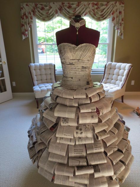 Paper dress created for a bridal shower. By Taylor Heberling Clothes Made From Recycled Materials, Paper Garments, Paper Dress Art, Recycled Costumes, Newspaper Dress, Paper Dresses, Crazy Dresses, Dress Paper, Book Dress