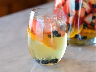 Sparkling Sangria Recipe | Ree Drummond | Food Network Food Network Recipes Pioneer Woman, Sparkling Sangria, Ree Drummond Recipes, Picnic Recipes, Orange Liqueur, Sangria Recipe, Strawberries Blueberries, Pioneer Woman Recipes, Tv Food