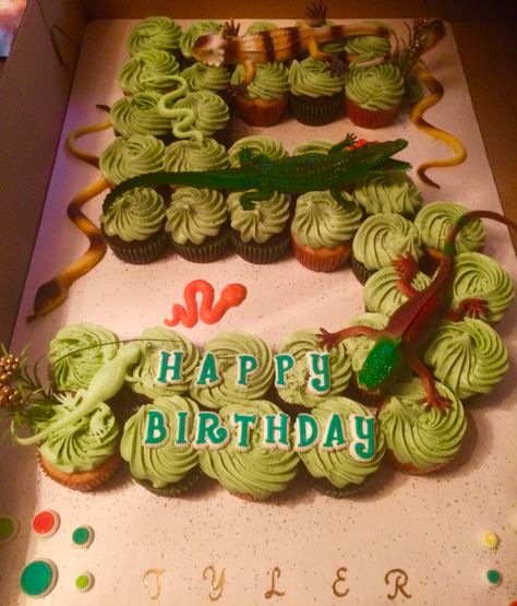 Custom Reptile Cupcake Cake!! Place your custom orders today. www.chanelgaskew.wixsite.com/mysite Snake Cupcake Cake, Reptile Cake, Reptile Cupcakes, Reptile Birthday Cake, Reptile Cakes For Boys, Reptile Themed Birthday Party Food, Alligator Birthday Party Food, Snake Birthday Cake Reptile Party, Costco Cake