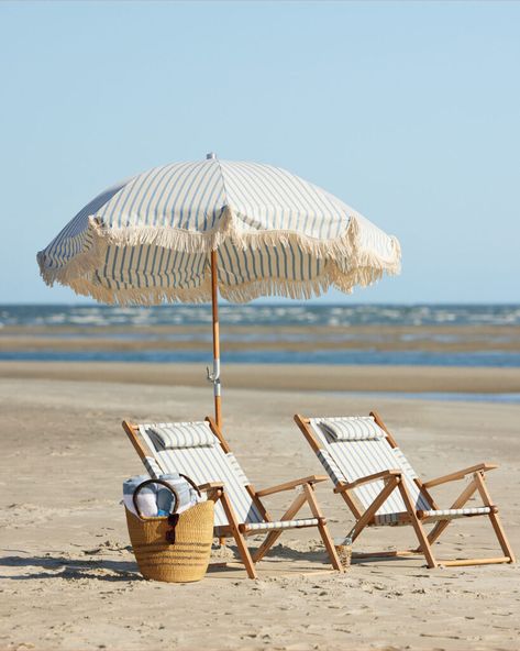 How to spot the coastal grandmother aesthetic, which includes blue and white stripes and days at the beach. Coastal Grandmother, Style Lounge, Best Sunset, Teak Frame, Beach Chair, Coastal Blue, Serena & Lily, Beach Umbrella, Beach Reading